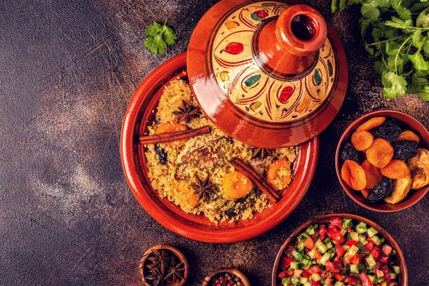 A vibrant Moroccan Lamb Tagine featuring apricot dry fruit, showcasing rich colors and traditional spices.