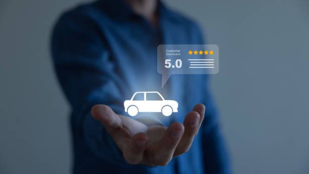 A man holds a car icon in his hand, with a rating icon displayed on a screen, symbolizing affordable car insurance options.